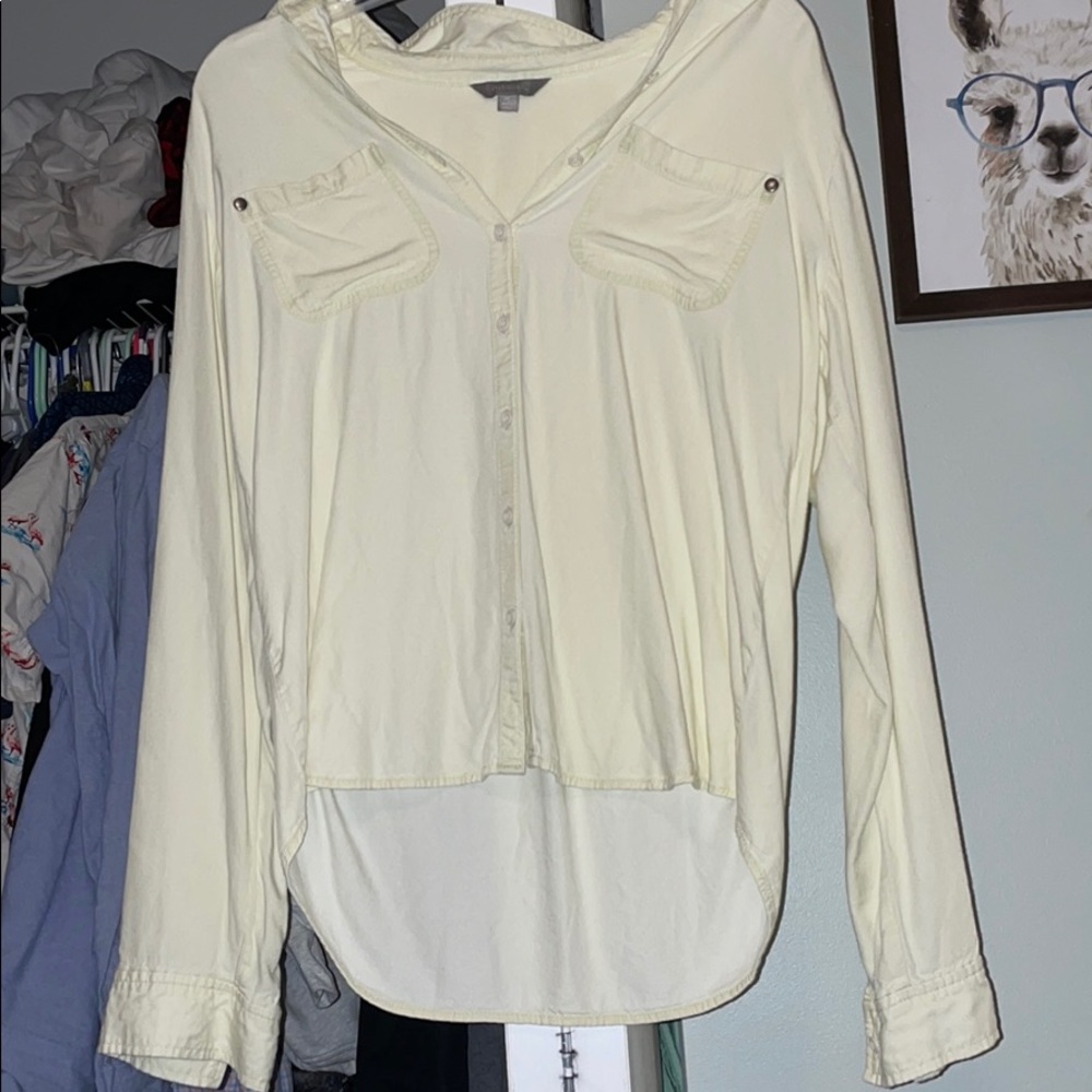 Yellow button up shirt
